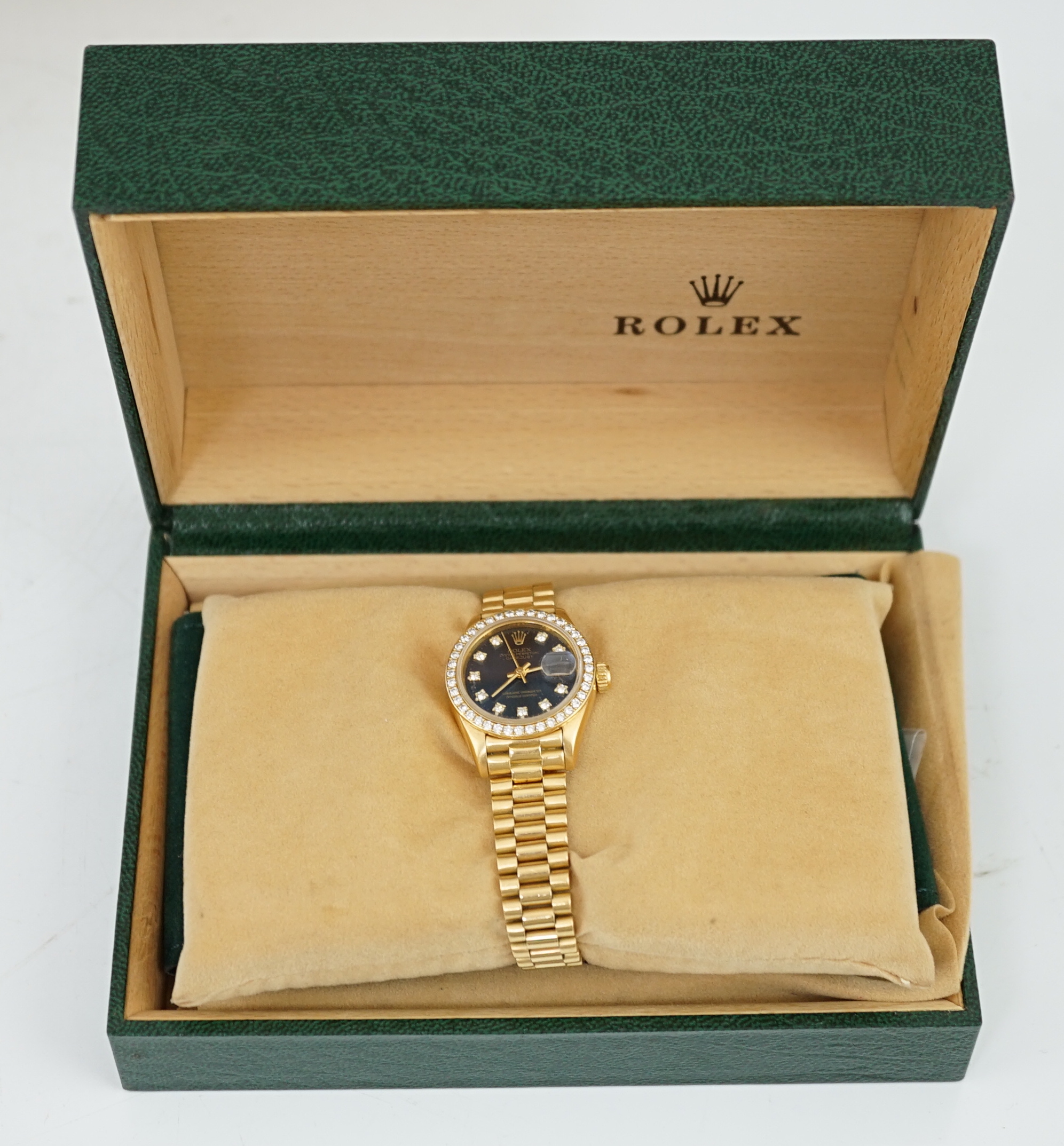 A lady's 1990 18ct gold and diamond set Rolex Oyster Perpetual Datejust wrist watch